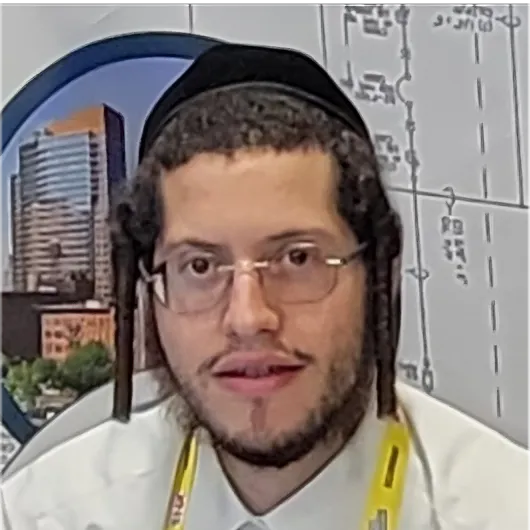 a man with a beard and glasses